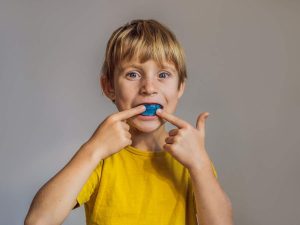 A child wearing his Myobrace appliance from our Bentonville dentist